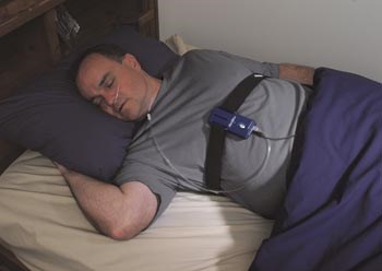 Photo of man going through sleep screening